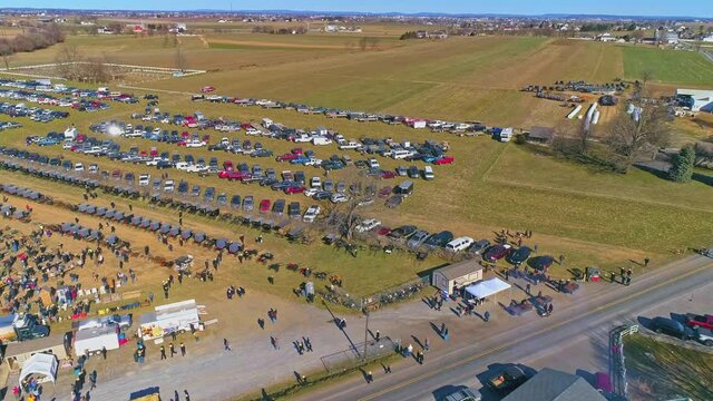 An Aerial View of an Amish Mud Sale in Pennsylvania Selling Amish Products on a Sunny Day