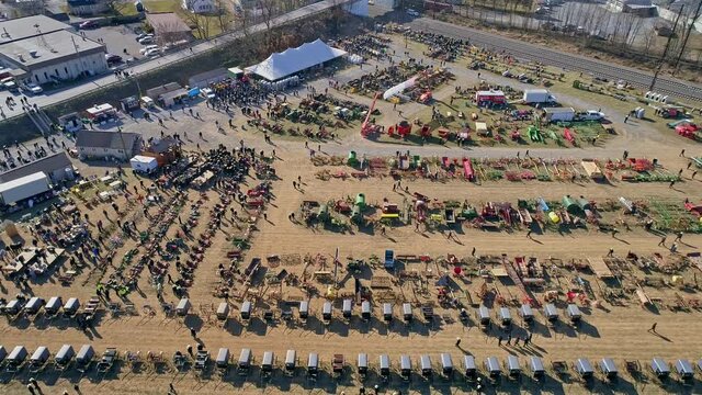 An Aerial View of an Amish Mud Sale in Pennsylvania Selling Amish Products on a Sunny Day