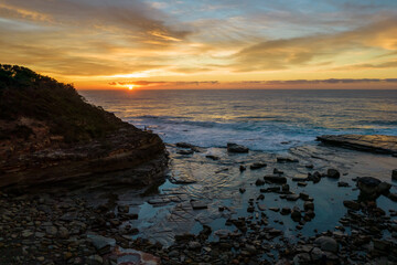 Aerial Sunrise Seascape at Rocky Inlet with colourful high cloud