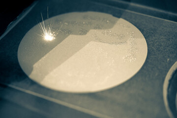 Metal is sintered under the action of laser into desired shape