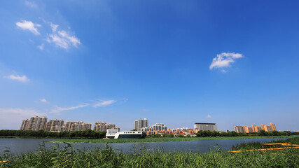 Fototapeta na wymiar Beautiful waterfront city scenery, North China