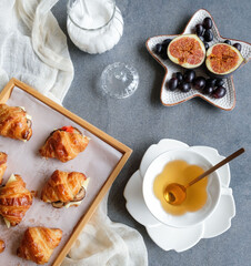 Light snacks for between meals / Mini Croissant and Tea / It goes well with mushrooms and cheese  fillings. Fresh fruits like figs and black grapes as sweet treats