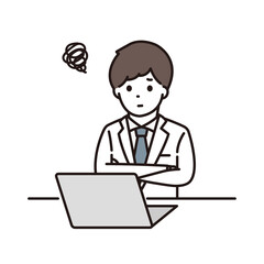 パソコンの前で腕組みをして悩む男性薬剤師