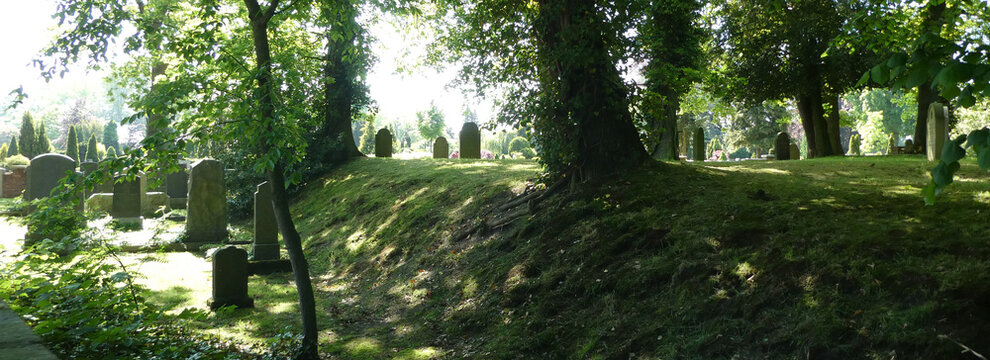Old very quiet and atmospheric Jewish cemetery. In the background is a Christian graveyard. The oldest grave is from 1771