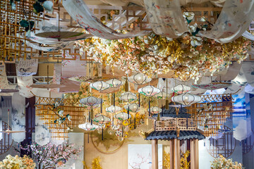 Modern wedding scene, crystal lamp and metal carved ceiling
