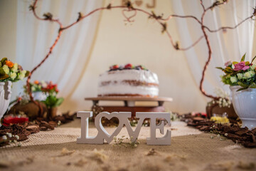 cake decorated with fruit with word love