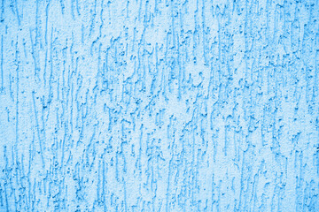 Concrete blue wall background on the street.