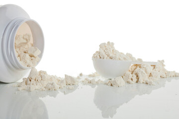 Container of protein powder on a white background.