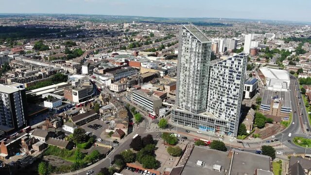Aerial view of the two tall towers and Ilford town centre on a sunny day
