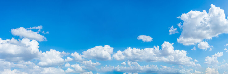 many white clouds in the blue sky