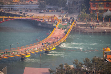 Fototapeta na wymiar Bridge over Holy River Ganges in Haridwar Uttarakhand India, bridges of India. . High quality photo