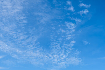 Blurred white clouds on the sky background.