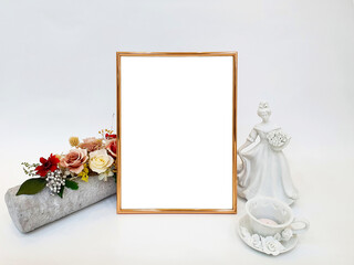 Gold frame mockups on white background.  Blank picture frame mock-up in interior design. White wall background. Artistic display.