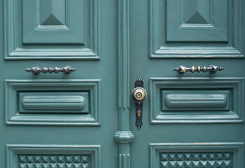 Parts of renovate wooden door - brass handles and lock close