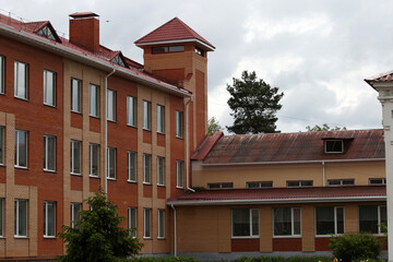 Vintage brown brick building in the street