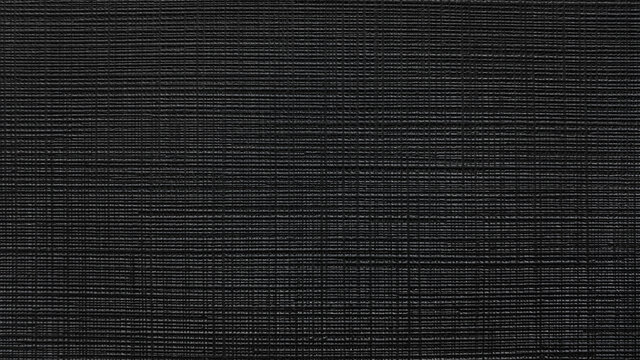 black textile fabric wallpaper texture background for interior wall covering. grunge canvas fabric background.