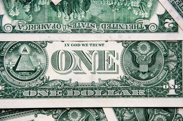  one-and two-dollar bills on a blue background.financial concept