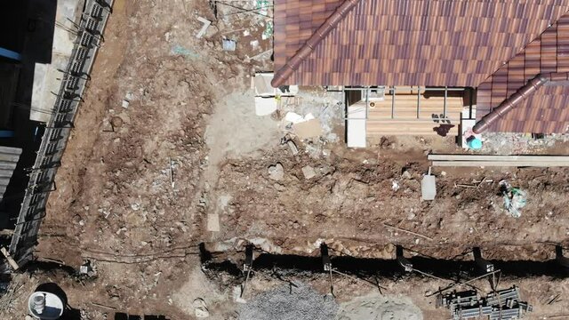 Aerial view cement roof in new house building with motion movement