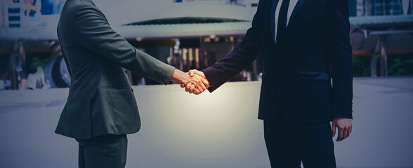Banner of successful Businesspeople team work which handshake and Success concept of handshaking...