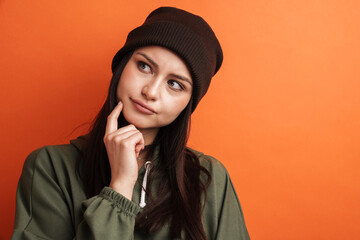 Happy young casual brunette woman