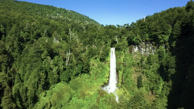 Drone shot of waterfall in the south of chile , near pucon , called "el salto del le&oacute;n" ore waterfall of the lyon. dolly in