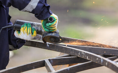 Sparks from metal cutting at a construction site. Technologies