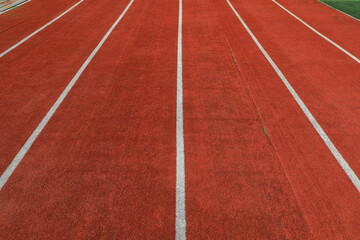 The red plastic track is on the playground