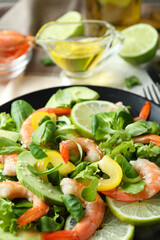 Concept of tasty eating with shrimp salad, close up
