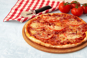 Freshly baked pizza on table close up
