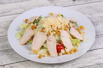 Caesar salad with chicken breast
