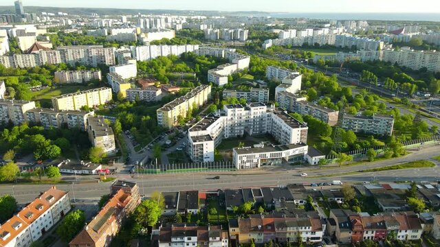 Apartment Blocks In Zaspa With Vehicles Driving In The Road On A Sunny Day In Gdansk, Poland. - aerial