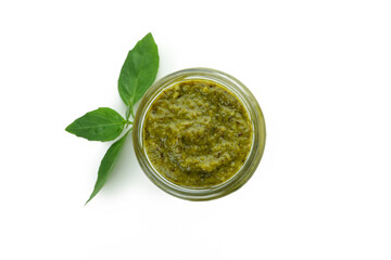 Jar of Pesto sauce isolated on white background