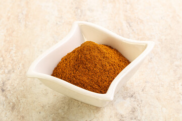 Dry Paprika powder in the bowl