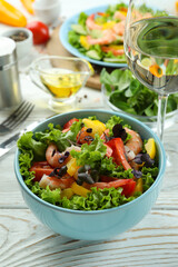 Concept of tasty eating with shrimp salad, close up