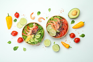 Concept of tasty eating with shrimp salads on white background