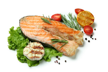 Tasty grilled salmon and ingredients on white background
