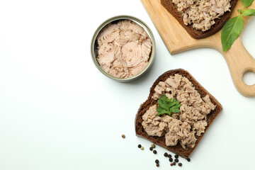 Tasty tuna sandwiches on white background, space for text
