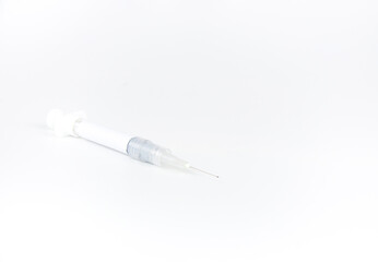 Fototapeta premium Syringe needle injected empty space label for text on white background. medical and treatment concept.