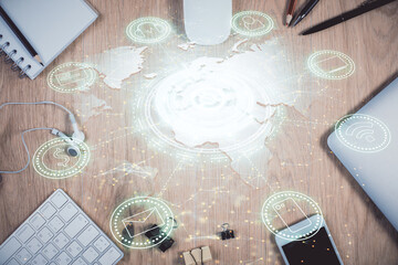 Double exposure of social network theme drawing over table with phone. Top view. People connecting...