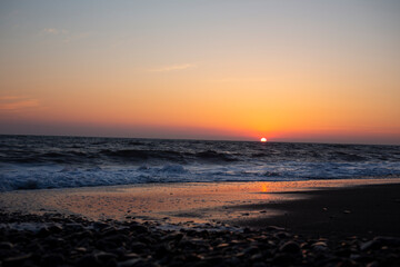 Beautiful view of the panorama and the sea at sunset, summer evening