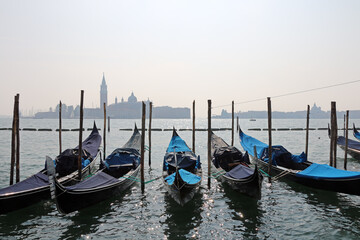 Fototapeta premium Romantic view of gondolas and grand canal of Venice.
