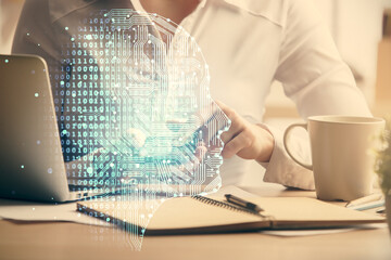 Double exposure of brain sketch hologram and woman holding and using a mobile device.