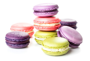 heap of French macarons isolated on white background