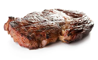 Foto auf Alu-Dibond roasted rib-eye beef steak isolated on white background © Pineapple studio