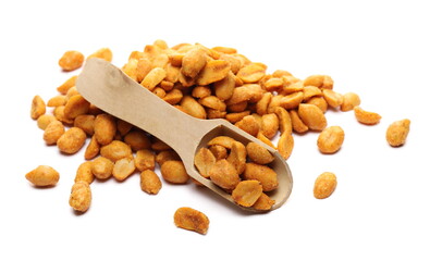 Spicy hot peanuts pile and wooden spoon isolated on white background