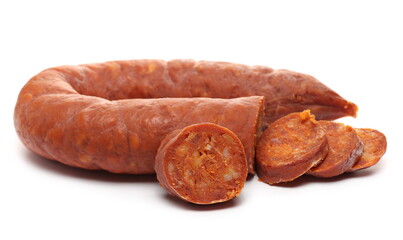 Fermented semi-hard dried spicy sausage slices, pig meat isolated on white background