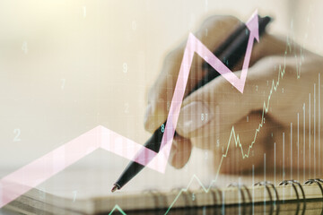 Double exposure of abstract creative financial diagram with upward arrow and woman hand writing in...