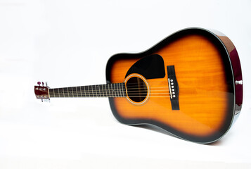 Obraz na płótnie Canvas Brown guitar on white background