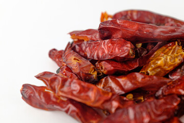 dried red pepper on a white background