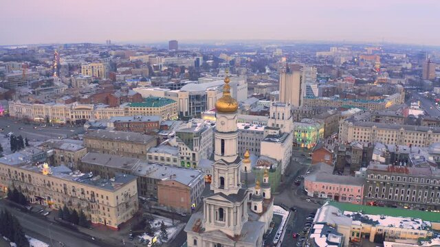 Kharkiv city from above. Aerial view of the Assumption Cathedral (Uspenskiy Sobor). View of city center at winter.